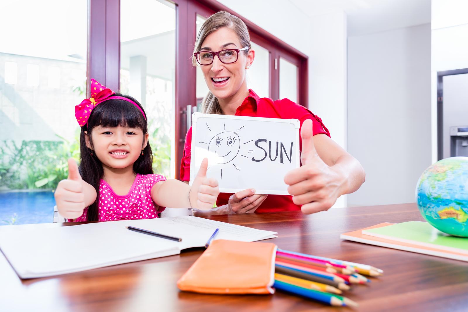 English teacher with a young learner, recruited by ESLstarter
