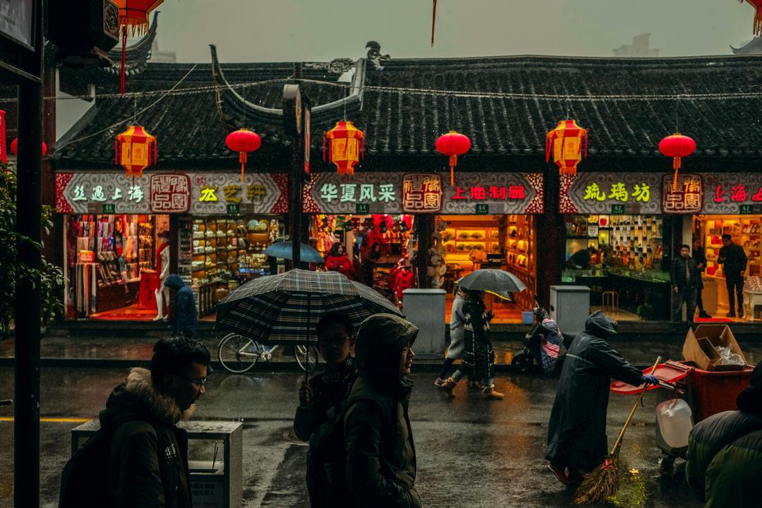 Red lanterns above traditional shops in Shanghai's old town