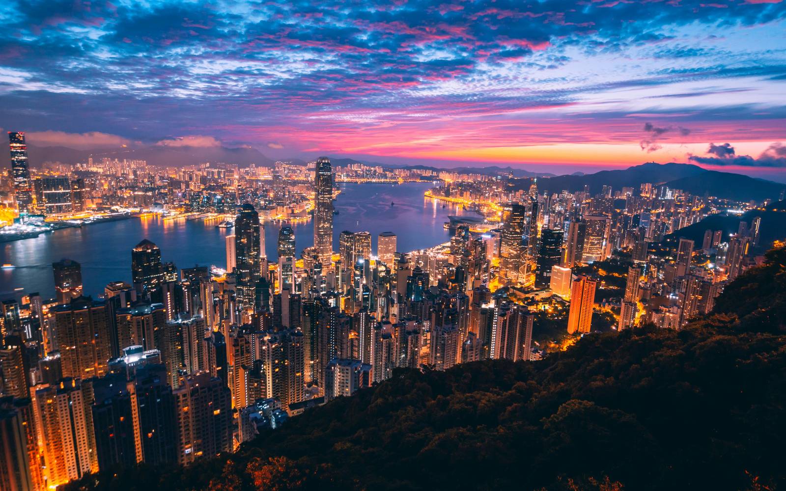 Hong Kong skyline and Victoria Harbour from the Peak at dusk, teach in Hong Kong on the NET Scheme