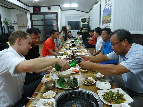 English teacher sharing Korean barbecue with school colleagues