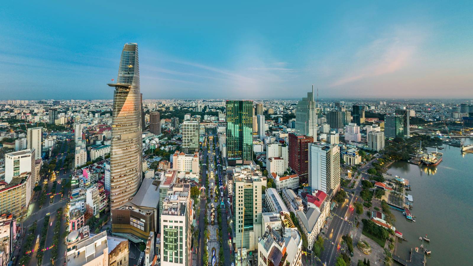 Aerial view of central Ho Chi Minh City with Bitexco Tower and the Saigon River